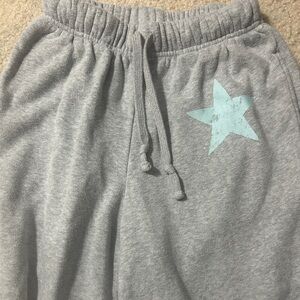 Grey sweatpants with blue star detail